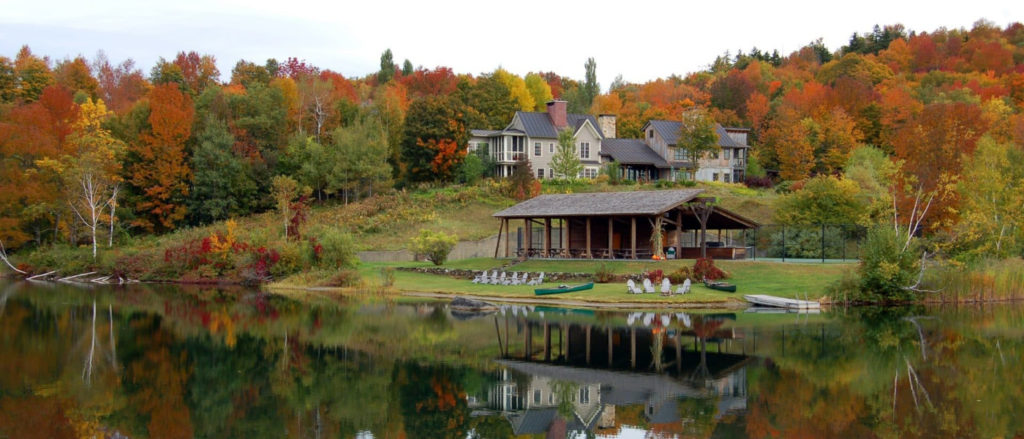 Autumn hotels blog header image, Twin Farms hotel sitting on the edge of a lake